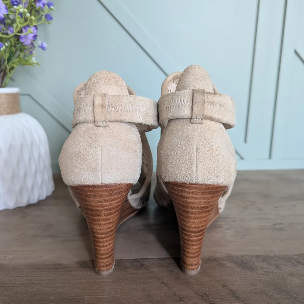 Cole Haan Edie Wedge Booties. These peep-toe wedge sandals